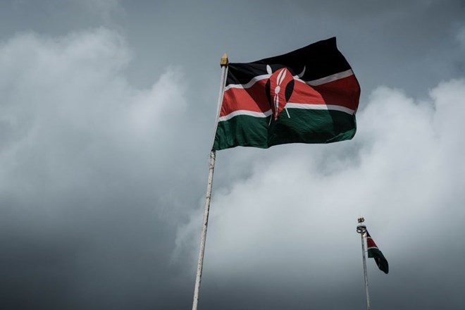 Kenya's national flag flies in Nairobi. Photographer: YASUYOSHI CHIBA/AFP