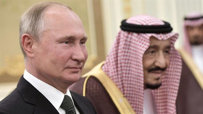 Russian President Vladimir Putin with Saudi Arabia's King Salman in Riyadh [Reuters]