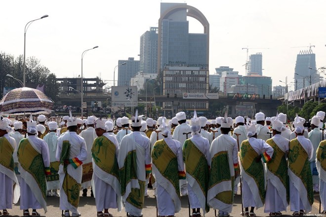 Priests attend the Meskel festival at Meskel Square in Addis Ababa, Ethiopia on 27 September 2019. [Minasse Wondimu Hailu - Anadolu Agency]